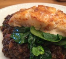 Pan Fried Cod with Wilted Spinach on Lentils